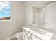 Bathroom with single vanity and window at 6173 Timberdale Ave, Wesley Chapel, FL 33545