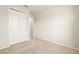 Bedroom with closet and access to hallway at 6173 Timberdale Ave, Wesley Chapel, FL 33545