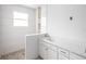 New bathroom featuring white vanity and pebble tile shower floor at 9024 Evelyn Rd, Englewood, FL 34224