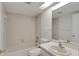 Clean bathroom with bathtub, toilet and vanity at 1034 Bowsprit Ln, Holiday, FL 34691