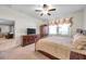 Main bedroom with king-size bed and ample closet space at 21489 Billowy Jaunt Dr, Land O Lakes, FL 34637