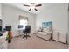 Home office with a desk, comfortable seating, and stylish decor at 21489 Billowy Jaunt Dr, Land O Lakes, FL 34637