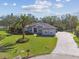 Luxury home with paver driveway and lush landscaping at 6522 Spyglass Ln, Bradenton, FL 34202