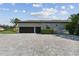 Spacious two-car garage with paver driveway at 6522 Spyglass Ln, Bradenton, FL 34202