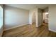 Bedroom with wood flooring and an ensuite bathroom at 10402 Pendleton Ave, Englewood, FL 34224