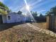 Backyard with stone path leading to deck at 3631 4Th N Ave, St Petersburg, FL 33713