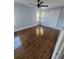 Spacious bedroom with hardwood floors and ceiling fan at 3631 4Th N Ave, St Petersburg, FL 33713