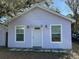 Charming light purple house with a front door and windows at 3631 4Th N Ave, St Petersburg, FL 33713