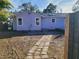 House exterior with stone path to backyard at 3631 4Th N Ave, St Petersburg, FL 33713