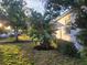 Landscaped side yard with tropical plants at 3631 4Th N Ave, St Petersburg, FL 33713