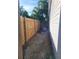 Private side yard with wooden fence and AC unit at 3631 4Th N Ave, St Petersburg, FL 33713