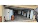 Large garage with ample storage cabinets and workbench at 4780 Butterfly Ne Pl, St Petersburg, FL 33703