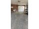 Unfinished garage with concrete floor and overhead door at 4780 Butterfly Ne Pl, St Petersburg, FL 33703