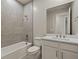 Bathroom with single vanity, shower/tub combo and tile flooring at 11267 Boundless Ter, Venice, FL 34293