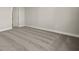 Simple bedroom with carpeted floor and door to bathroom at 11275 Boundless Ter, Venice, FL 34293