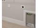 Laundry area with tile flooring, wall mounted outlets and water supply and drain hookups at 17909 Solstice Ave, Venice, FL 34293