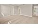 Spacious primary bedroom features neutral carpeting, paint, and trim at 17909 Solstice Ave, Venice, FL 34293