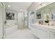 Spa-like bathroom with soaking tub and walk-in shower at 936 79Th S St, St Petersburg, FL 33707