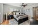 Cozy bedroom featuring a comfortable bed and hardwood floors at 936 79Th S St, St Petersburg, FL 33707