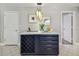 Kitchen island with wine rack and quartz countertop at 936 79Th S St, St Petersburg, FL 33707