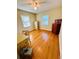 Spacious bedroom featuring hardwood floors and ample natural light at 1453 Turner St, Clearwater, FL 33756