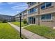 Condo building exterior showing walkway and landscaping at 4915 Bay Ne St # 123, St Petersburg, FL 33703