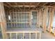 Unfinished interior walls and framing of a new home at 664 Allora Ave, Nokomis, FL 34275