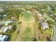 Aerial view of golf course and surrounding homes at 435 Palmdale Dr, Oldsmar, FL 34677