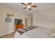 Bedroom with tile floors, built-in closet, and ceiling fan at 435 Palmdale Dr, Oldsmar, FL 34677