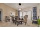 Elegant dining room with a formal table, chairs, and large windows providing natural light at 435 Palmdale Dr, Oldsmar, FL 34677