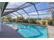 Large, refreshing pool with screened enclosure overlooking the golf course at 435 Palmdale Dr, Oldsmar, FL 34677