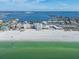 Aerial view of beachfront property, showcasing building and surrounding area at 4950 Gulf Blvd # 206, St Pete Beach, FL 33706