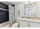 Bathroom with white vanity and marble top at 4950 Gulf Blvd # 206, St Pete Beach, FL 33706