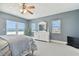 Beachfront bedroom with ocean view and ceiling fan at 4950 Gulf Blvd # 206, St Pete Beach, FL 33706