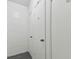 White storage units in a clean storage area at 4950 Gulf Blvd # 206, St Pete Beach, FL 33706