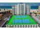 Two tennis courts situated near the beach at 4950 Gulf Blvd # 206, St Pete Beach, FL 33706