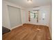 Bright dining area with wood-look floors and access to the kitchen at 519 Greenway Dr, Plant City, FL 33566