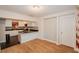 Modern kitchen with white cabinets and granite countertops at 519 Greenway Dr, Plant City, FL 33566