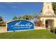 MiraBay community entrance sign, featuring a grand entrance and lush landscaping at 5205 Covesound Way, Apollo Beach, FL 33572