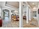 Open concept dining room with hardwood floors and access to kitchen and pool at 5205 Covesound Way, Apollo Beach, FL 33572