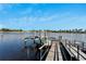 Private dock with lift for boats and kayaks at 5205 Covesound Way, Apollo Beach, FL 33572