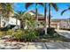 House exterior with porch and mature landscaping at 5205 Covesound Way, Apollo Beach, FL 33572