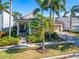 Charming single-story house with manicured landscaping and a welcoming front porch at 5205 Covesound Way, Apollo Beach, FL 33572