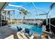 Enclosed pool with water feature, and lake view at 5205 Covesound Way, Apollo Beach, FL 33572