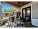 Cozy screened patio with outdoor seating and dining area at 5205 Covesound Way, Apollo Beach, FL 33572