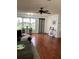 Open living room with hardwood floors and lots of natural light at 5603 80Th N St # 107, St Petersburg, FL 33709