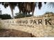 Stone entrance sign for Fred Howard Park, a Pinellas County park at 1408 Riverside Dr, Tarpon Springs, FL 34689