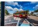 Red trolley on the street in Tarpon Springs at 1408 Riverside Dr, Tarpon Springs, FL 34689