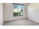 Empty bedroom with carpeted floor and large window at 4214 Duck Creek Way, Ellenton, FL 34222