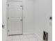 Laundry room with tile floor and access door at 4214 Duck Creek Way, Ellenton, FL 34222